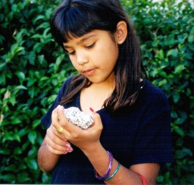 Inspecting a rock sample.