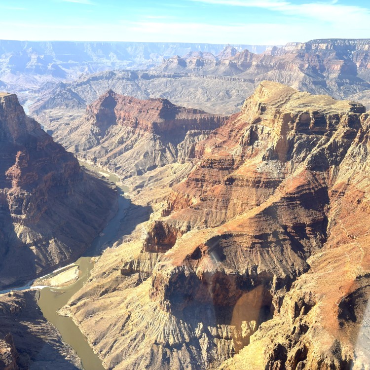 Our Grand Canyon Tour Company spots the river.