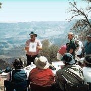 Tauck tour group enjoying a geology talk at the Grand Canyon.